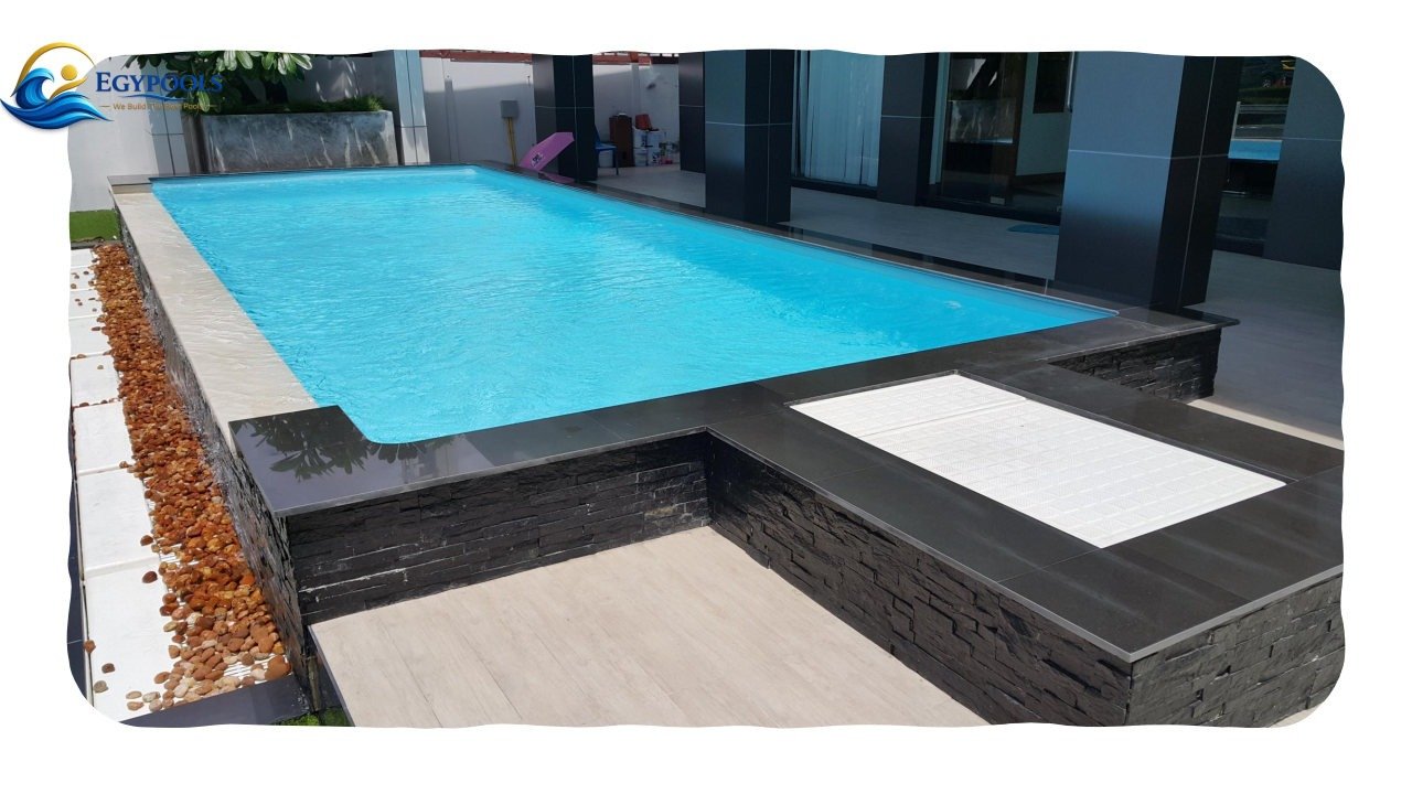 Infinity swimming pool with mosaic edge